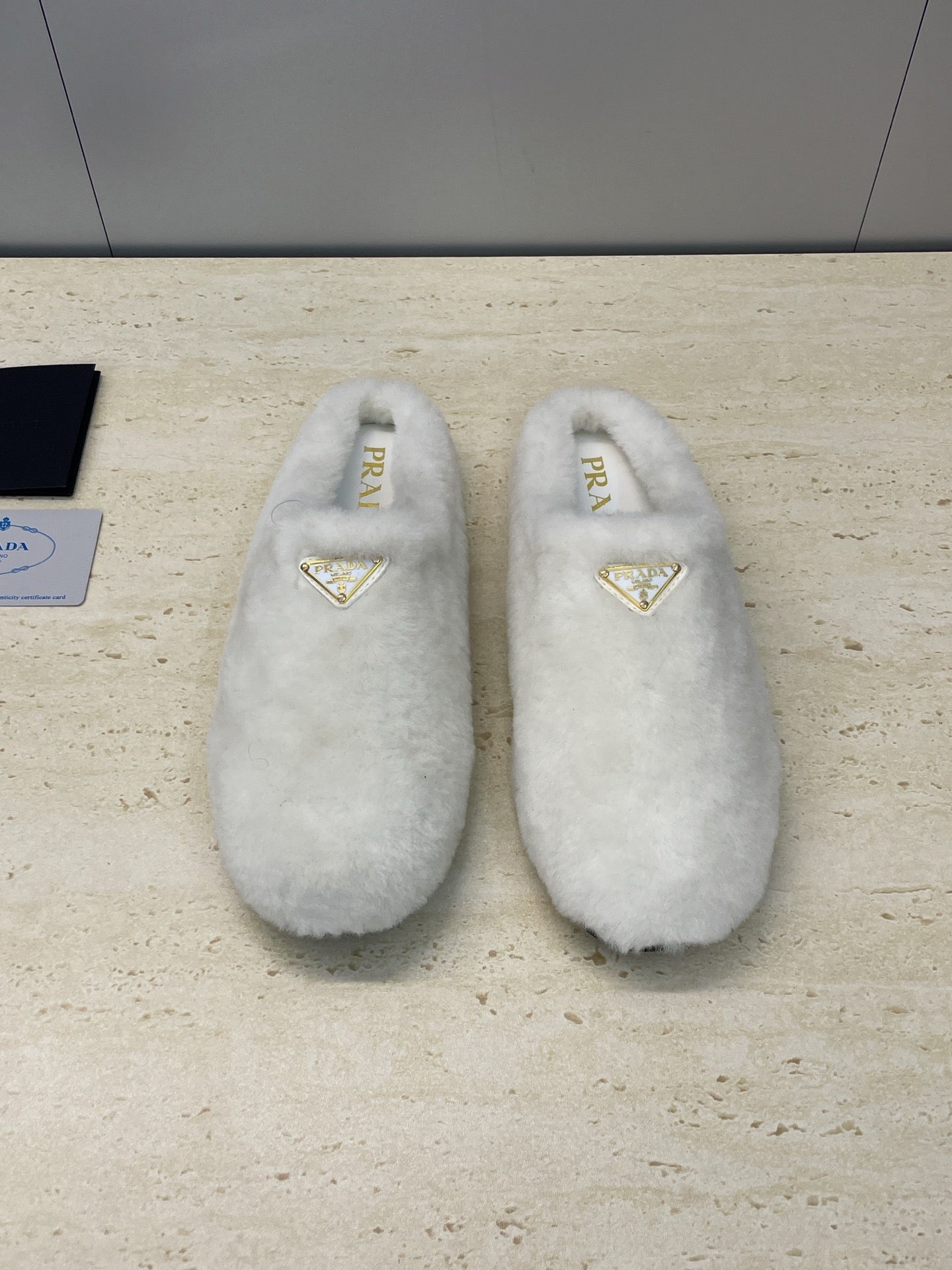 Prada 25s Slide White Shearing 551887