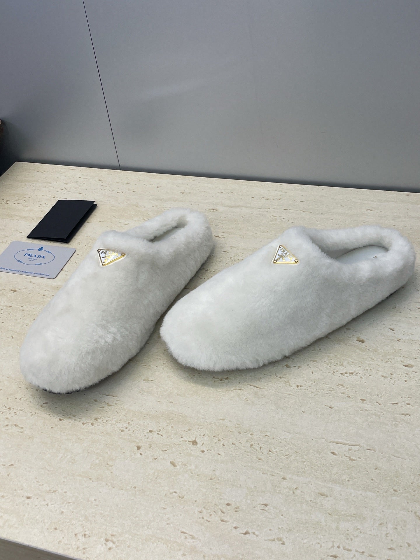 Prada 25s Slide White Shearing 551887